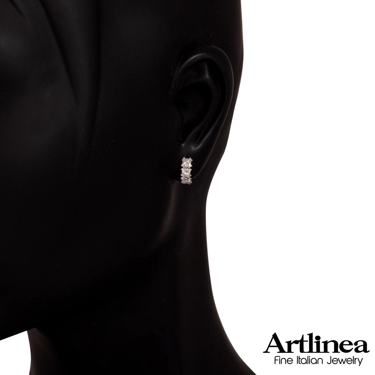 Trilogy earrings with princess cut diamonds